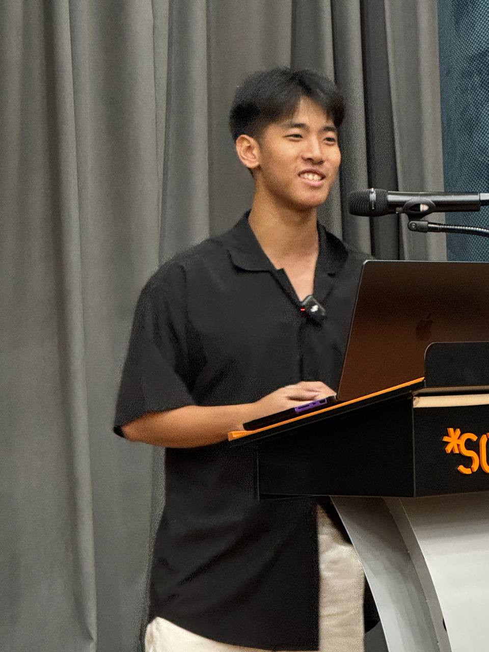 Kaleb presenting the Voice Resume at Roast #4